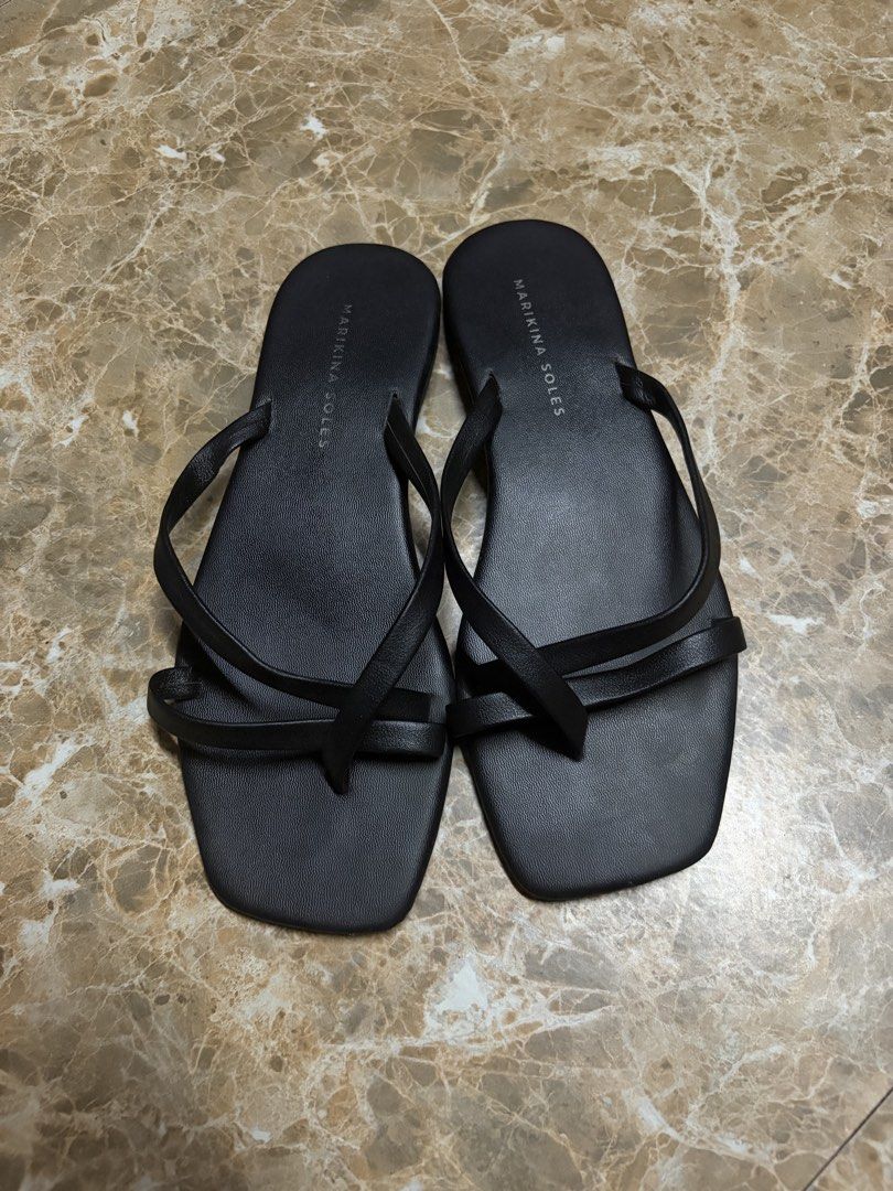 Marikina Soles black flat sandals (Category: Flats & Sandals) located in Bacoor. Submitted by jblns (Listing ID 1466441738, Image 2). Description: - Brand/Style: Marikina Soles black sandals Used once during a trip. Best fits normal width feet..