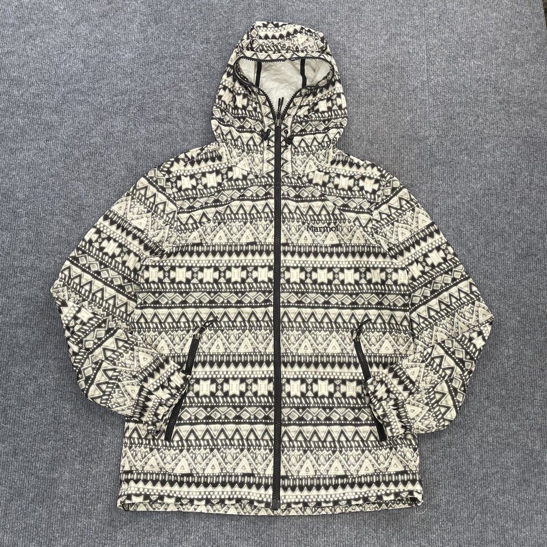Marmot full-zip outdoor windbreaker jacket (Category: Coats, Jackets and Outerwear) located in Iloilo. Submitted by 3ift2heav3n (Listing ID 1466456640, Image 1). Description: Marmot full-zip outdoor windbreaker jacket by featuring an intricate geometric Aztec-style or Navajo-inspired tribal pattern in black, white, and beige. Authentic/original Like new condition No flaw's Waistline 22 Lenght 28.