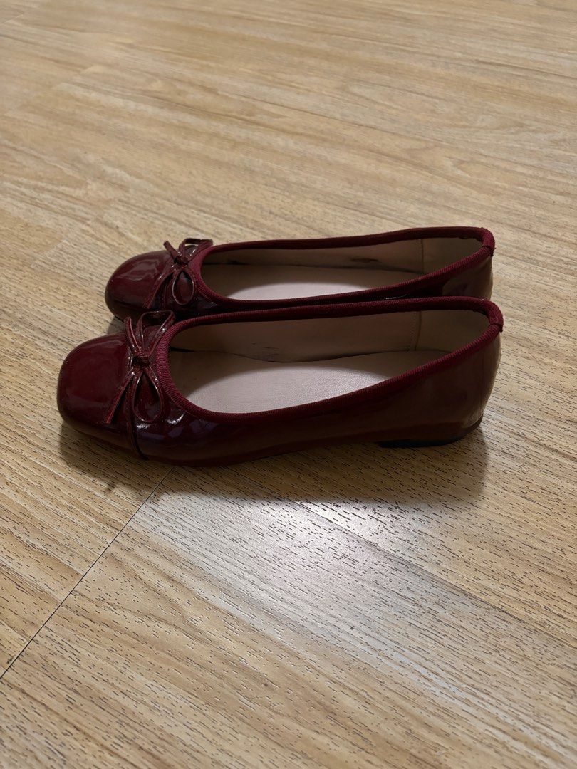 Maroon Patent Leather Bow Ballet Flats (Category: Flats & Sandals) located in Manila. Submitted by j_decluttering (Listing ID 1466444764, Image 1). Description: - used a few times, still almost new condition - comfy - fits 6-7.