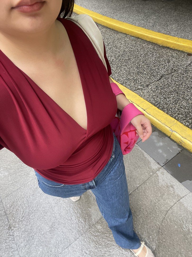 maroon v-neck wrap top (Category: Blouses) located in Pateros City. Submitted by jiannaross (Listing ID 1466476804, Image 1). Description: - Color: Rich maroon - Style: Deep V-neck, surplice wrap with short sleeves - Material: Super stretchy fabric with soft chest draping - Versatility: Pairs easily with blue jeans or skirts - Condition: Worn a couple of times, still in great shape.