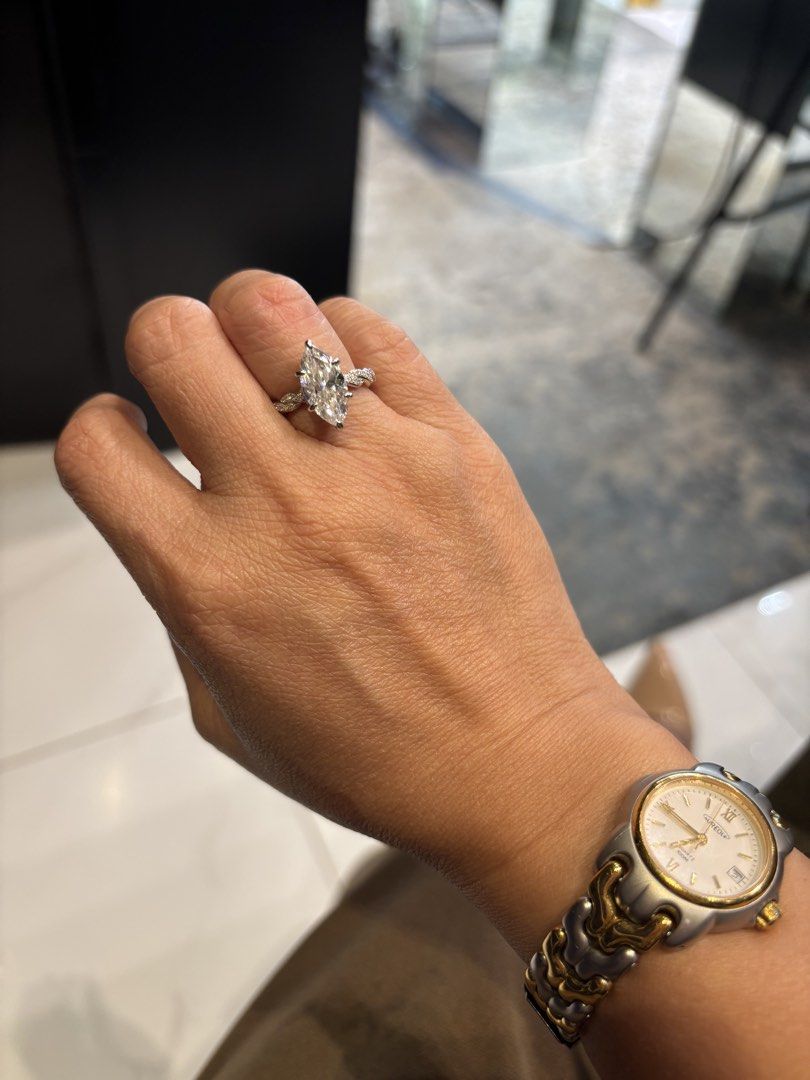 Marquise Cut Diamond Ring with Twisted Pave Band (Category: Rings) located in Las Pinas. Submitted by loukasprimeholding (Listing ID 1466390833, Image 1). Description: - Large marquise-cut center stone with a secure prong setting - Silver-tone metal band featuring a twisted design - Fully covered in tiny, sparkling pavé diamonds all around the shank - Catches the light with a clean sparkle from every angle - Designed for a comfortable fit on the 
