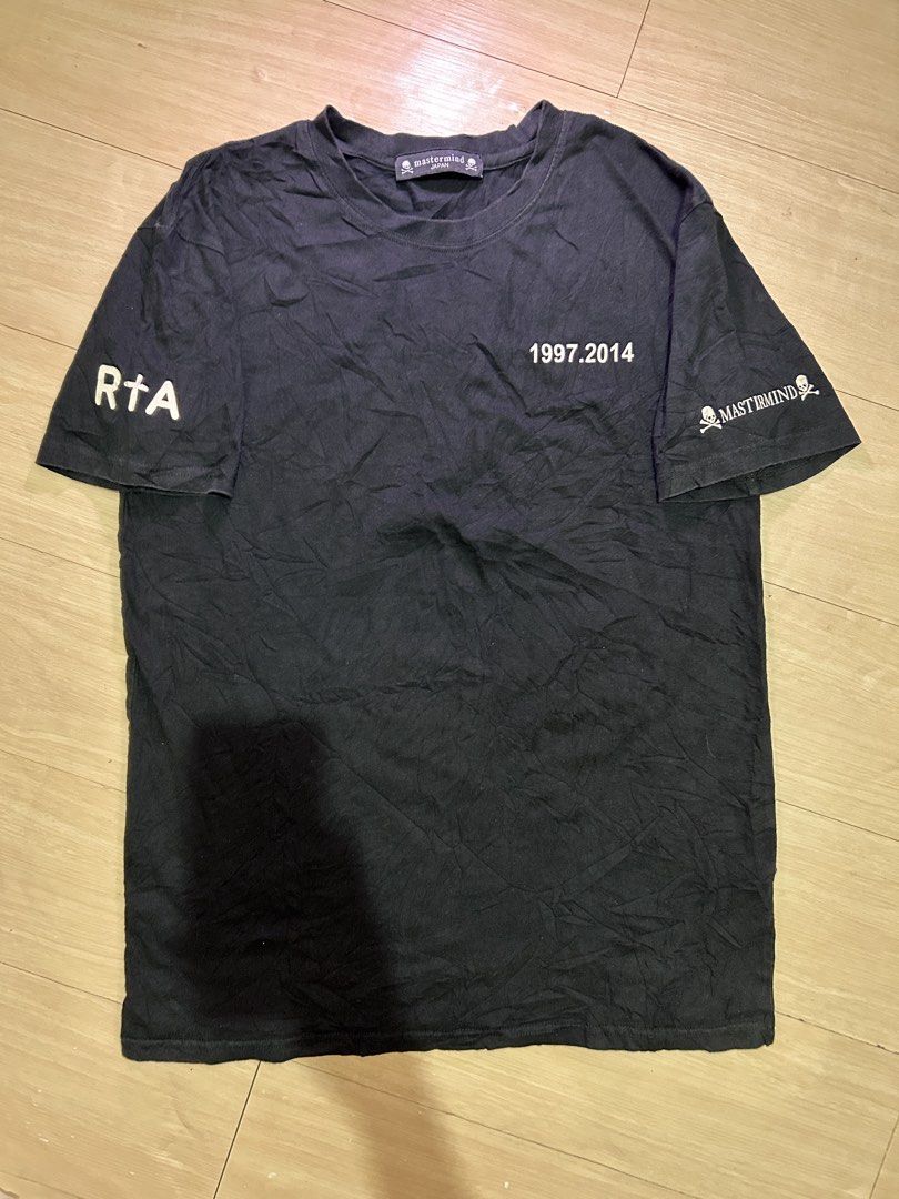 Mastermind Japan x RTA Graphic Tee Black (Category: Activewear) located in Dipolog. Submitted by adrian281994 (Listing ID 1466483844, Image 1). Description: - Brand: Mastermind Japan x RTA Collaboration - Color: Black - Style: Short sleeve t-shirt - Front: '1997.2014' text print on chest - Sleeves: Mastermind logo text and signature skull graphics - Back: Large cross graphic with iconic skull and crossbones - Details: Official Mastermind Japan br