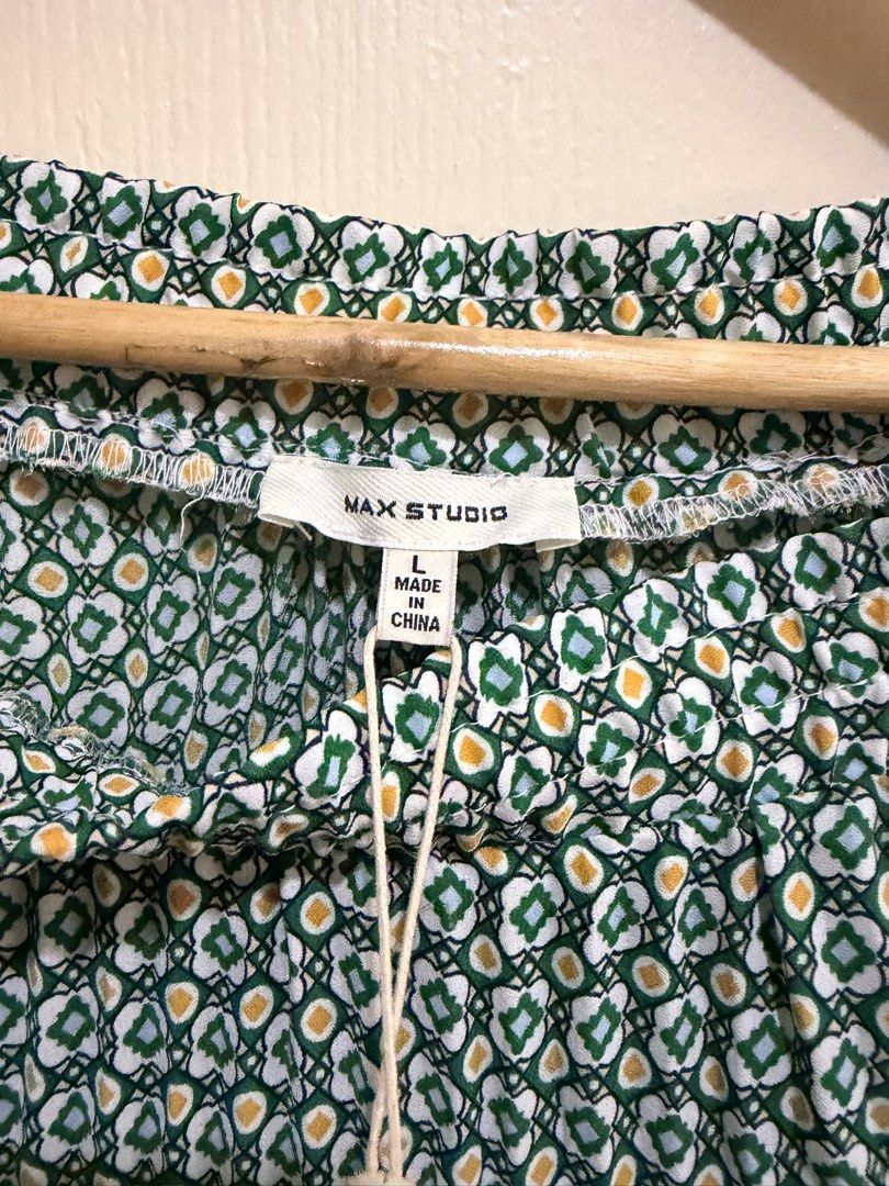 Max Studio Green Pleated Midi Maxi Skirt (Category: Skirts) located in Pasig City. Submitted by shopsmart.mnl (Listing ID 1466530154, Image 3). Description: BNWT L in tag 32” not stretched pa 33.5” length .