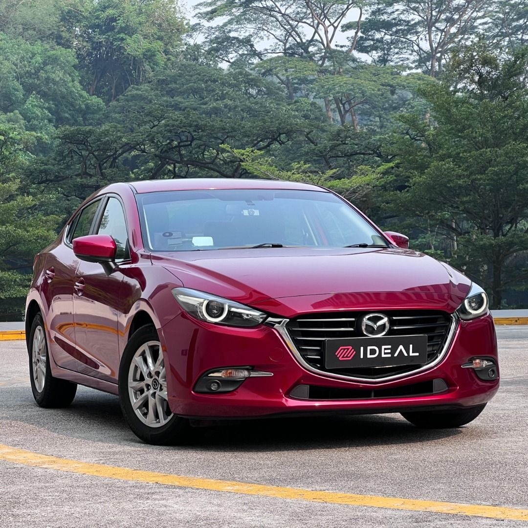 Mazda 3 Sedan 1.5 Deluxe (A) (Category: Used Cars) located in Singapore. Submitted by idealauto (Listing ID 1466443253, Image 1). Description: Features 1.5L 4 cylinder inline 16 valves DOHC, 6 speed SkyActiv-G engine producing 118bhp and 150nm of torque. Keyless entry/start/stop. Accessories Electric leather seats, sports rims, Sunroof, factory fitted audio with HUD/GPS/steering control, reverse camera/sensors, fog lights, folding mirrors. Descri