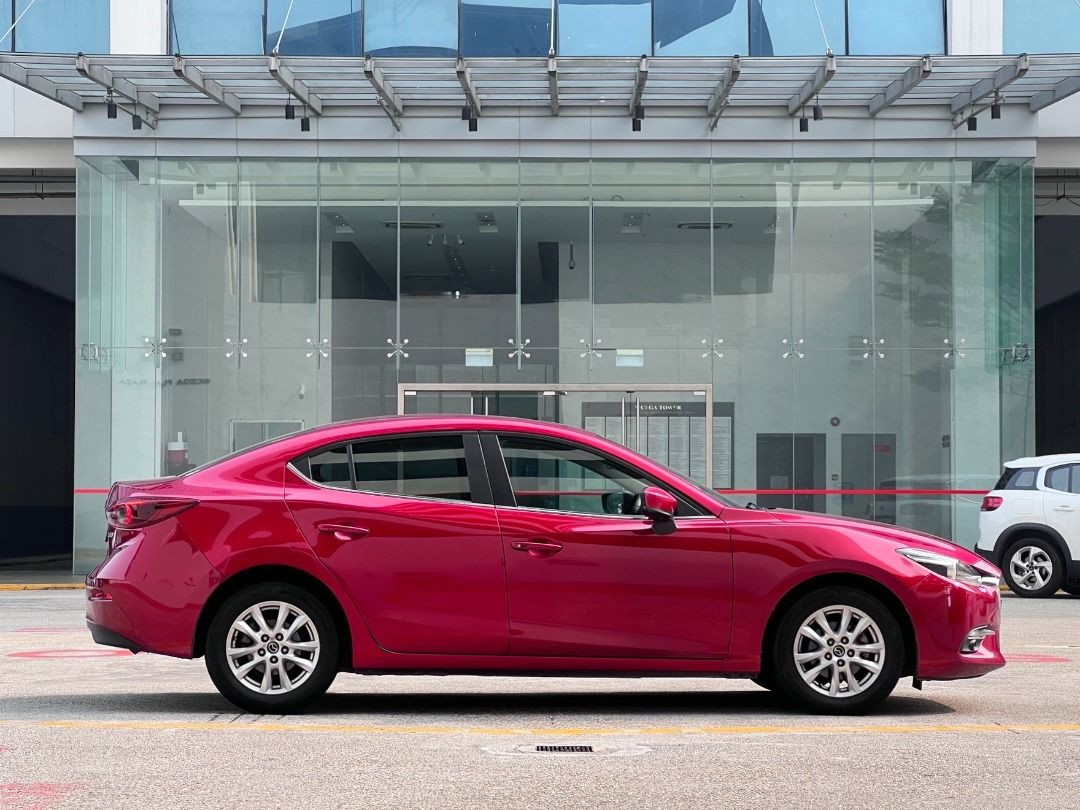 Mazda 3 Sedan 1.5 Deluxe (A) (Category: Used Cars) located in Singapore. Submitted by idealauto (Listing ID 1466443253, Image 3). Description: Features 1.5L 4 cylinder inline 16 valves DOHC, 6 speed SkyActiv-G engine producing 118bhp and 150nm of torque. Keyless entry/start/stop. Accessories Electric leather seats, sports rims, Sunroof, factory fitted audio with HUD/GPS/steering control, reverse camera/sensors, fog lights, folding mirrors. Descri