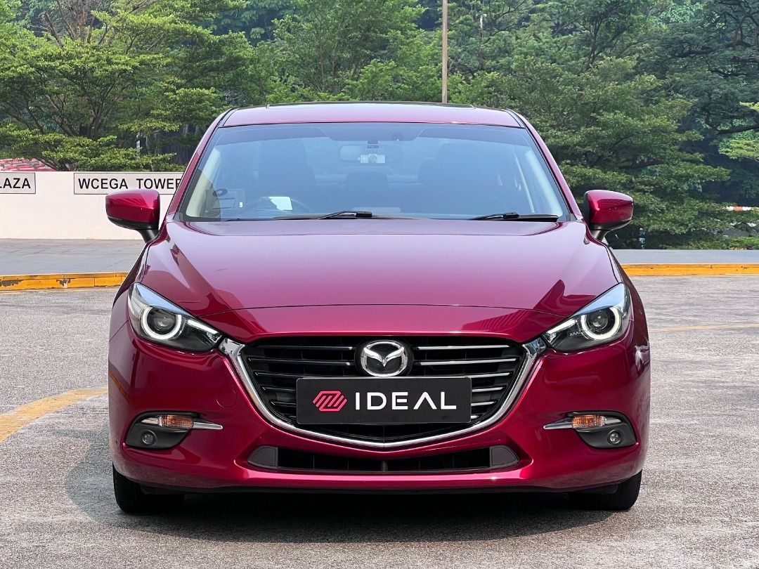 Mazda 3 Sedan 1.5 Deluxe (A) (Category: Used Cars) located in Singapore. Submitted by idealauto (Listing ID 1466443253, Image 2). Description: Features 1.5L 4 cylinder inline 16 valves DOHC, 6 speed SkyActiv-G engine producing 118bhp and 150nm of torque. Keyless entry/start/stop. Accessories Electric leather seats, sports rims, Sunroof, factory fitted audio with HUD/GPS/steering control, reverse camera/sensors, fog lights, folding mirrors. Descri