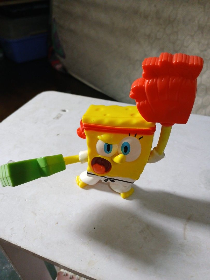 Mcdo Toys SpongeBob SquarePants Karate (Category: Figurines & Statues) located in Manila. Submitted by diczenestr94951 (Listing ID 1466355013, Image 1). Description: - Character: SpongeBob SquarePants - Outfit: Karate uniform (white gi, black belt, red headband, red gloves) - Accessory: Holding a green block - Perfect collectible toy for SpongeBob fans - Shipping via J&T or lalamove/ Meetups available.