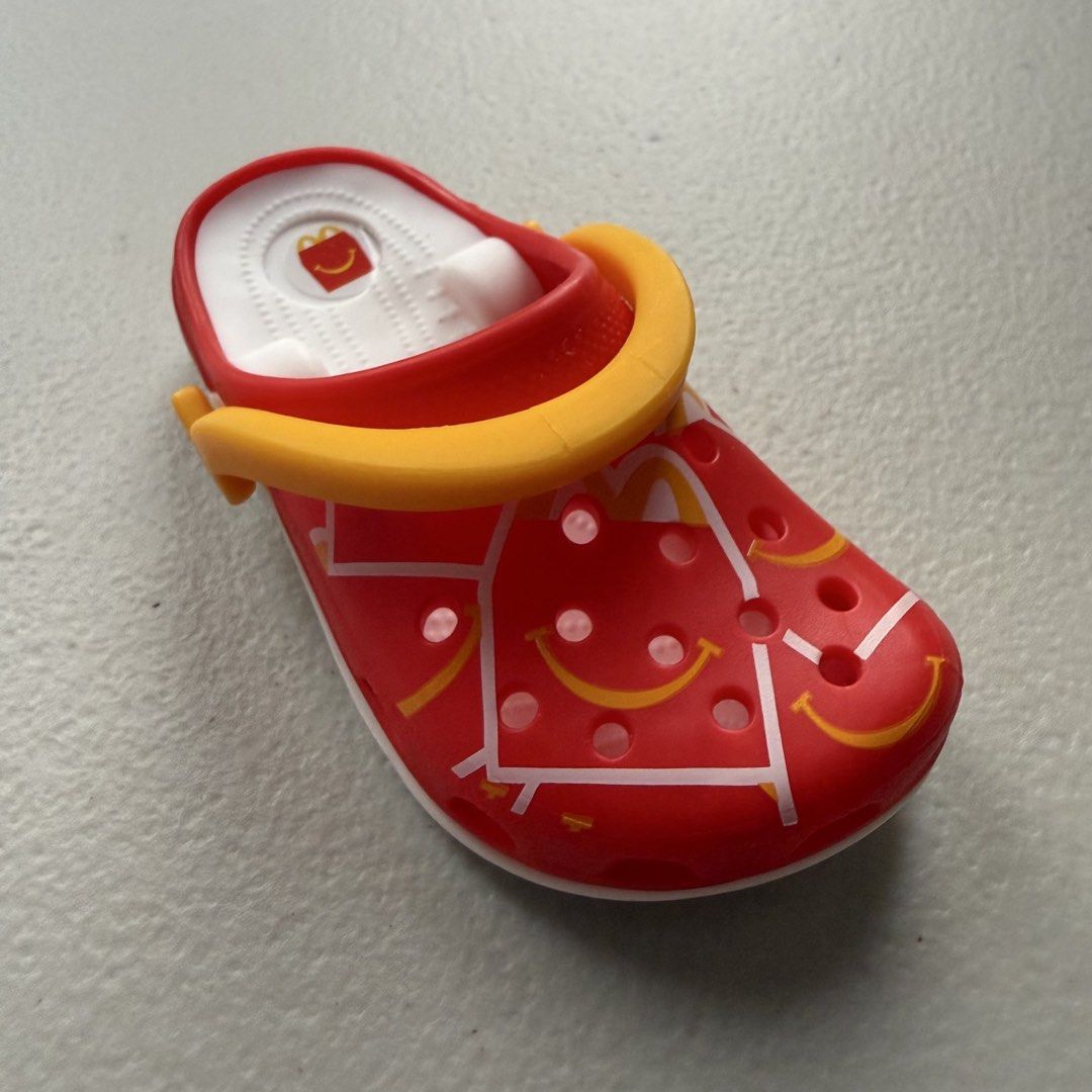 McDonalds Crocs Mini Keychain Toy Set (Category: Character Goods) located in Manila. Submitted by cheemkenn (Listing ID 1466428222, Image 3). Description: - RFS: these are my duplicates - ₱50 each, but ₱150 to take ALL 5 crocs keychain - Full set of McDonald's mini Crocs keychains - Features classic blue, red, and patterned designs - Complete with tiny Crocs sole branding, smiley faces, and yellow straps - Includes white attachment rings for easy