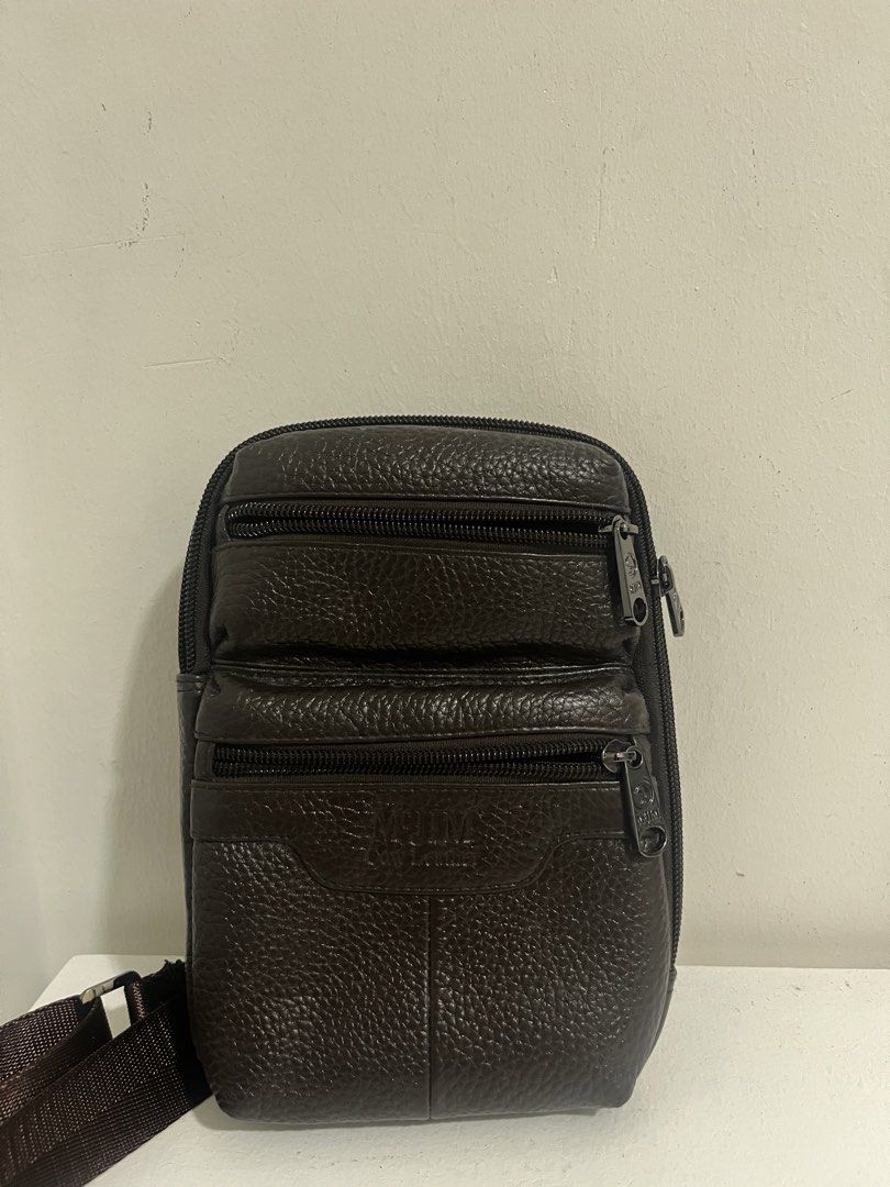 McJIM Classic Brown Sling Bag (Category: Sling Bags) located in Manila. Submitted by irish_closet (Listing ID 1466474359, Image 1). Description: - made of cow leather - brown - barely used - no issues, good quality..