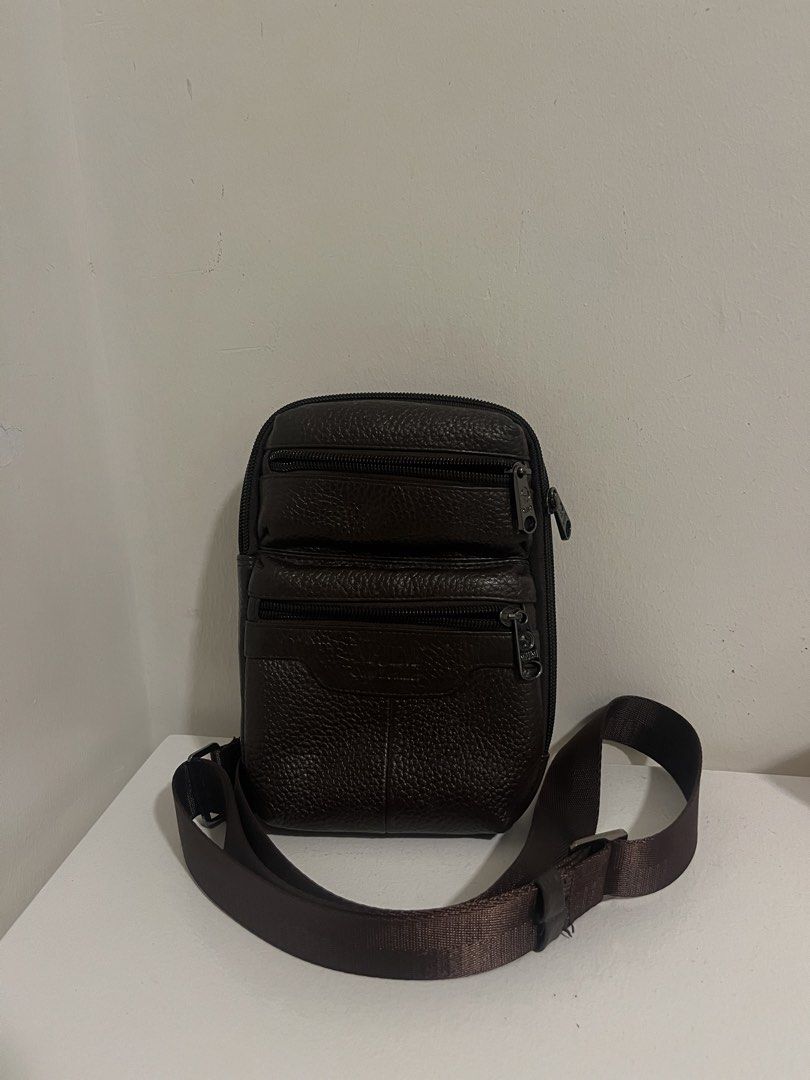 McJIM Classic Brown Sling Bag (Category: Sling Bags) located in Manila. Submitted by irish_closet (Listing ID 1466474359, Image 2). Description: - made of cow leather - brown - barely used - no issues, good quality..