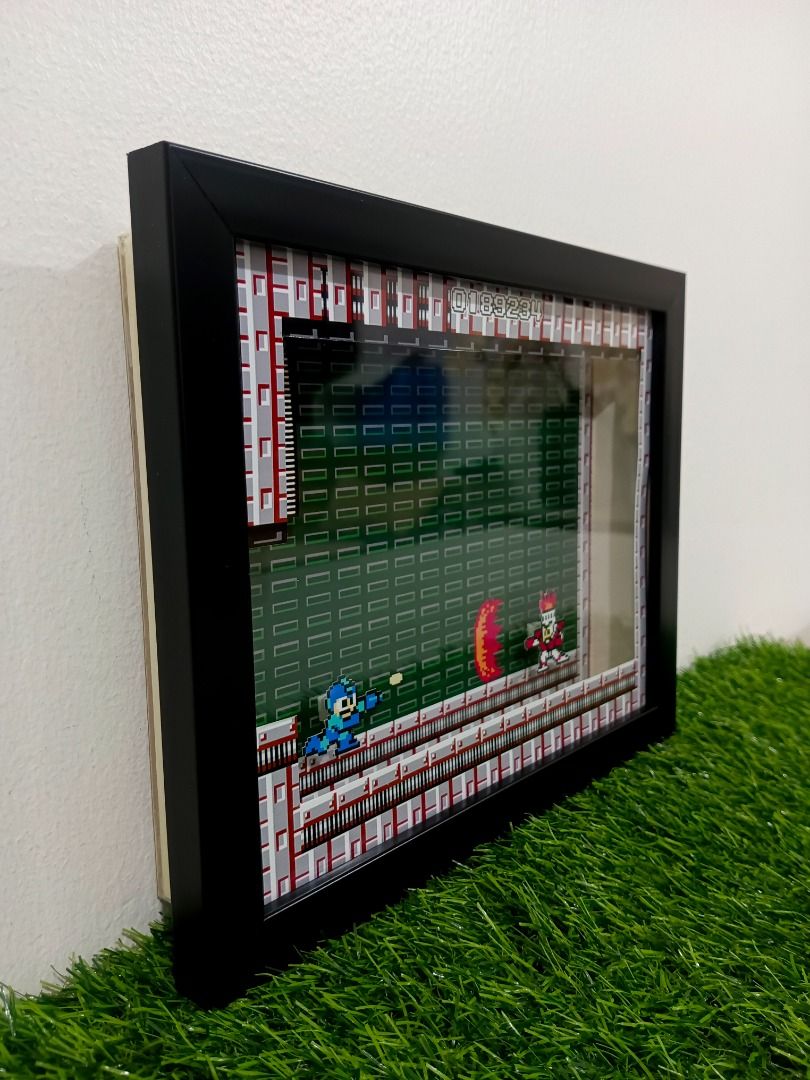 Megaman 1 Retro/Video Game Shadow Box (Category: Nintendo) located in Quezon City. Submitted by natzuki10 (Listing ID 1466365229, Image 3). Description: Megaman 1 Retro/Video Game Shadow Box Height: 8 inches Width: 10 inches *Handmade Pixel Shadow Boxes *Accepting Customized Designs *Perfect for Gamers & Collectors #videogames #playstation #nintendo #roomdecor #collection #gamer #gift.