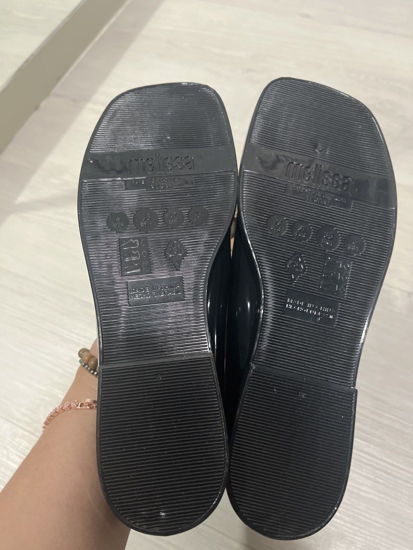 Melissa x Marc Jacobs Black Jelly Flats (Category: Flats & Sandals) located in Pasig City. Submitted by melaiski28 (Listing ID 1466555989, Image 2). Description: - Brand: Melissa x Marc Jacobs - Color: Black - Size: US 6 / EUR 37 / BRA 35 / JPN 23 - Material: Vegan jelly material, very comfortable - Design: Square toe with textured front patch and branded insoles - Style: Easy slip-on flats - Inclusions: Comes with original box - Condition: Great
