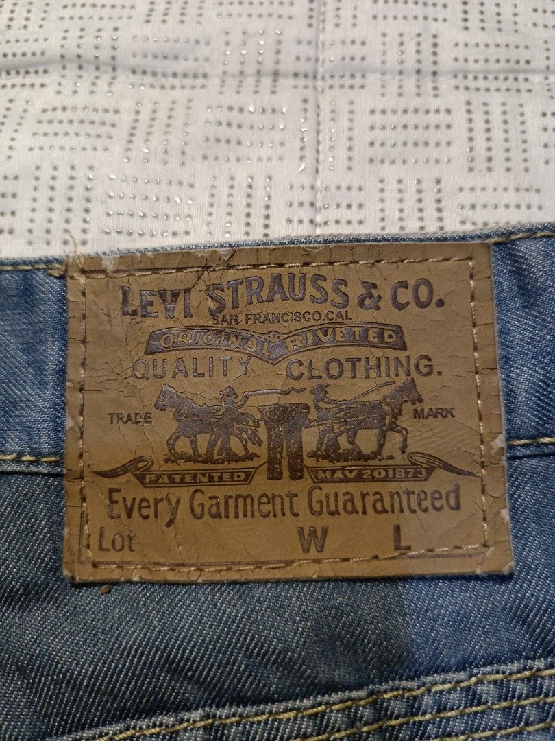 Men's Denim Pants (Levi's Style (Category: Jeans) located in Baganga. Submitted by rarethreadsph_4f356e (Listing ID 1466492759, Image 3). Description: "Selling pre-loved blue denim pants. Levi's design/reproduction patch. Fabric is thick and in great condition. Fits size: length/waist 41×15 leg opening: 8 see the Actual photos posted. Manage your expectations..