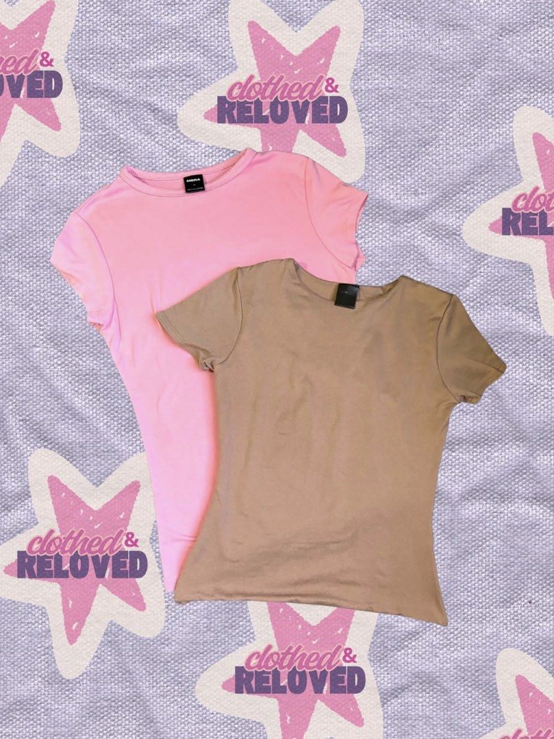Mera Short Sleeve Shirts (Category: Shirts) located in Binan City. Submitted by szummie (Listing ID 1466468355, Image 1). Description: - Bundle includes 2 basic short sleeve tees: Pink (Medium) and Brown (Small) - Classic crew neck with a standard casual fit - True to size and everyday basics.