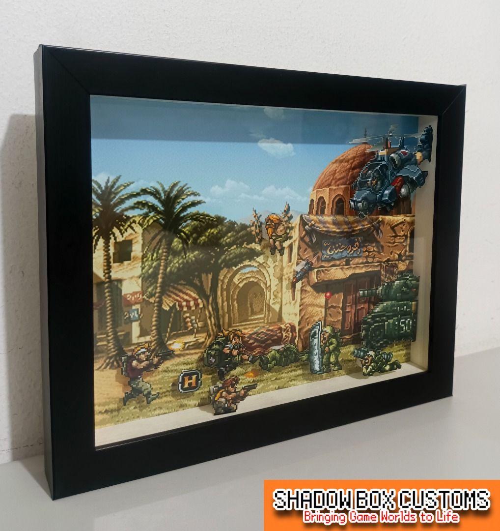 Metal Slug Retro Video Game Shadow Box (Category: Nintendo) located in Quezon City. Submitted by natzuki10 (Listing ID 1466369953, Image 3). Description: Metal Slug Retro Video Game Shadow Box Height: 8 inches Width: 10 inches 750 w/o lights 920 w/ lights *Handmade Pixel Shadow Boxes *Accepting Customized Designs *Perfect for Gamers & Collectors #videogames #roomdecor #collection #gamer #gift .
