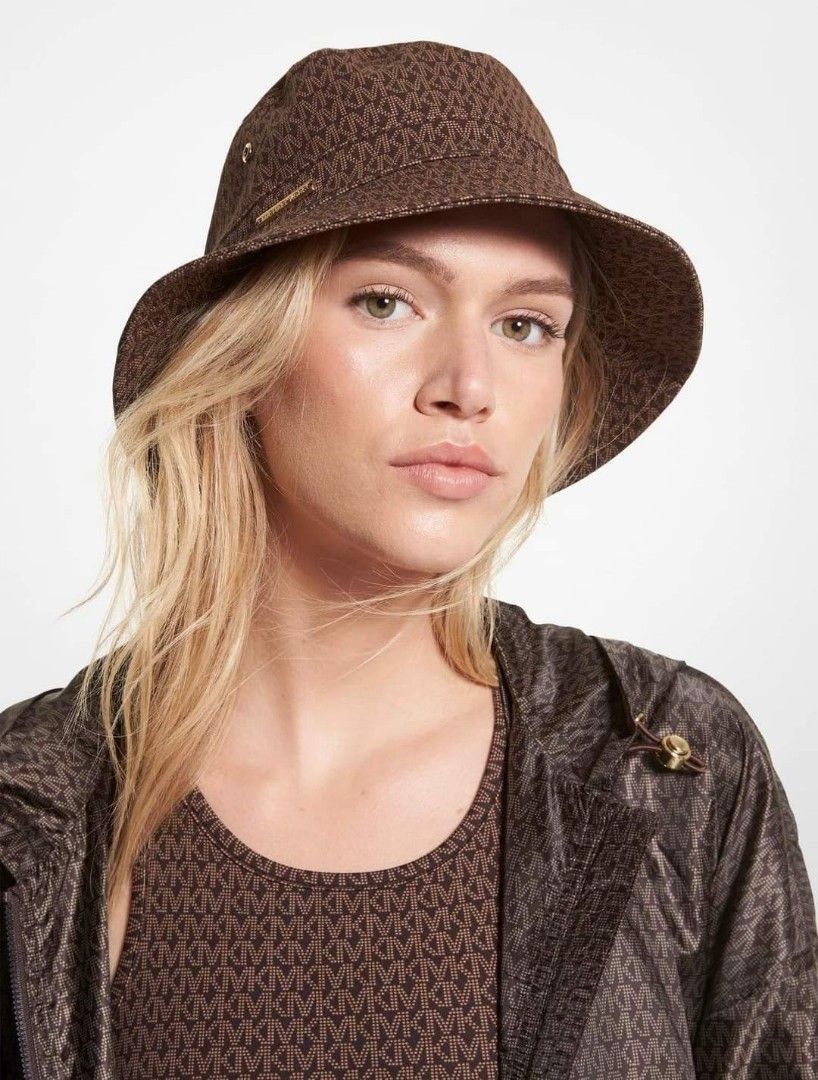 Michael Kors Brown Monogram Bucket Hat (Category: Hats & Beanies) located in Abucay. Submitted by itskylieeee_ (Listing ID 1466467239, Image 1). Description: Mikael Kors Bucket Hat Brand new from US clean authentic .