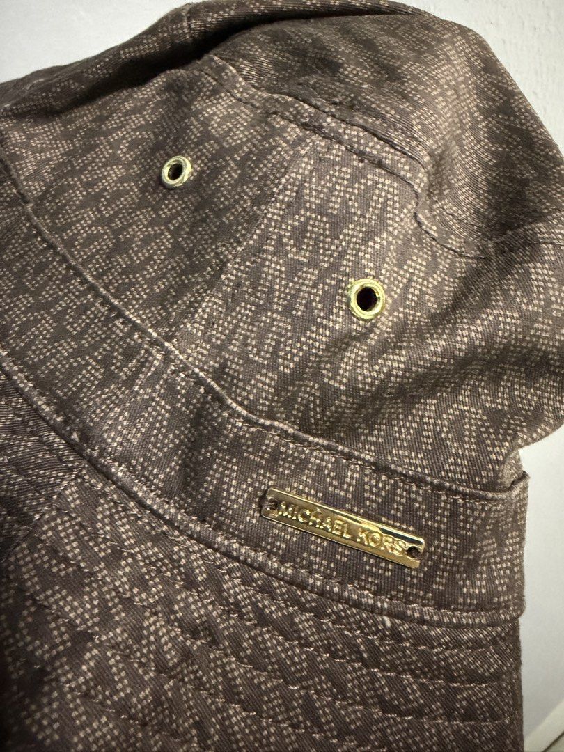 Michael Kors Brown Monogram Bucket Hat (Category: Hats & Beanies) located in Abucay. Submitted by itskylieeee_ (Listing ID 1466467239, Image 3). Description: Mikael Kors Bucket Hat Brand new from US clean authentic .
