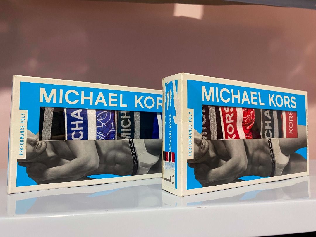 Michael Kors Performance Poly Boxer Briefs Box Set (Category: Underwear) located in Taytay. Submitted by itsjacousa (Listing ID 1466478167, Image 1). Description: - Size: Large and Medium - Material: 90% polyester, 10% elastane (or spandex) for a lightweight, flexible 4-way stretch - Performance: Quick-drying and moisture-wicking capabilities designed for active wear - Ideal for personal use or as a gift.