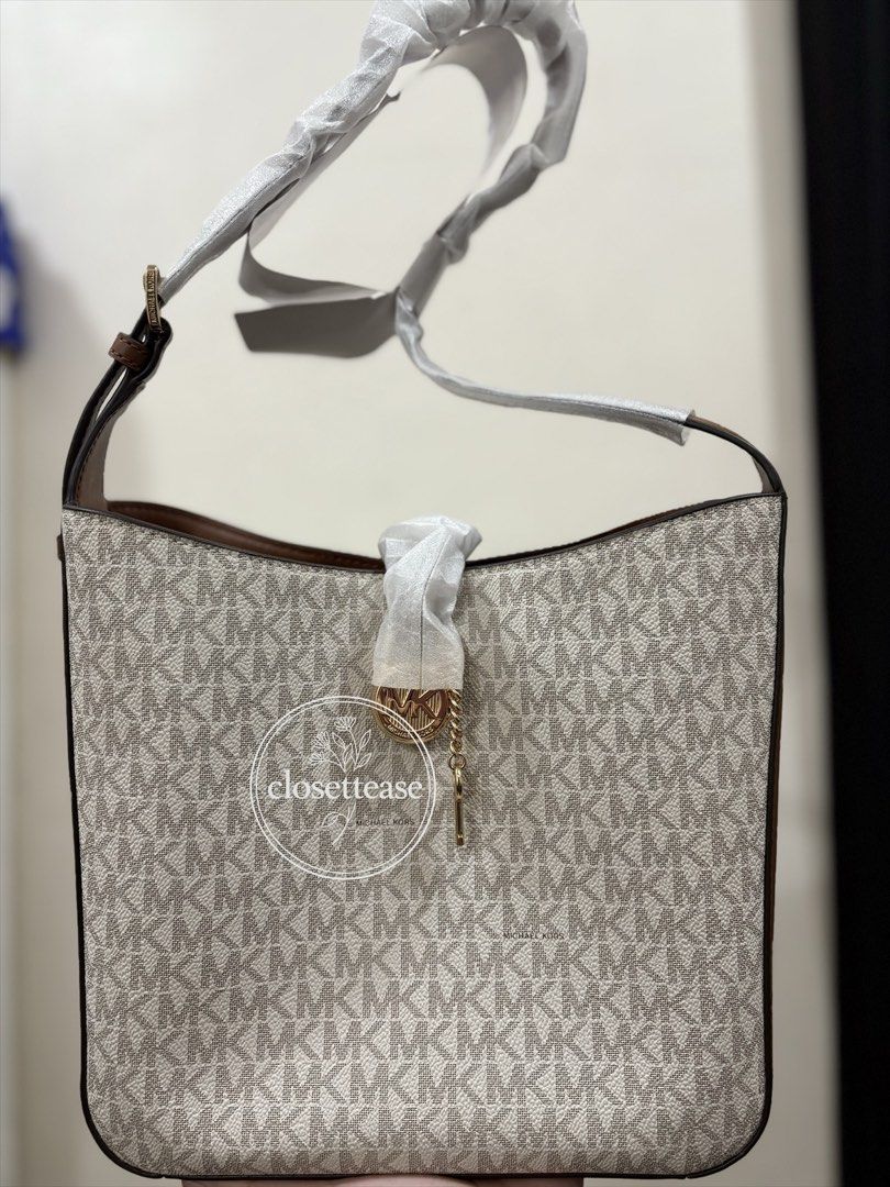 Michael Kors Shoulder Bag (Category: Shoulder Bags) located in Manila. Submitted by closettease (Listing ID 1466537566, Image 1). Description: Original no paperbag included. Small tote MK Lyra in Small Send pm for more pictures, not including all of the photos here to avoid photo grabbing 🤍.