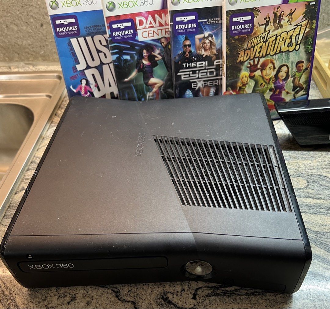 Microsoft Xbox 360 S 250GB Console with Kinect and 4 Games (Category: Xbox) located in Pasig City. Submitted by edgarlou (Listing ID 1466475561, Image 1). Description: - 110 VOLT - Console: Black Xbox 360 S with 250GB HDD (Tested & 100% working) - Included: Kinect sensor, 1 wireless controller, power brick, AV cables, and manuals - Games included: Just Dance 3, Dance Central, Kinect Adventures, and The Black Eyed Peas Experience - Perfect bundle 