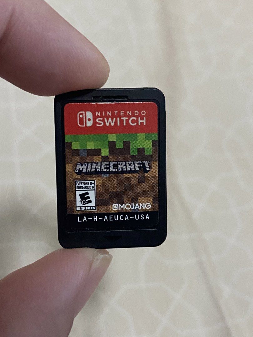 Minecraft Nintendo Switch Game (Category: Nintendo) located in Manila. Submitted by olxph_808966171 (Listing ID 1466561072, Image 2). Description: - Game: Minecraft - Platform: Nintendo Switch (US Version, Code: LA-H-AEUCA-USA) - Condition: Physical cartridge only, no case, clean pins, tested and working properly Rfs: Extra Qc pick up or Lala.