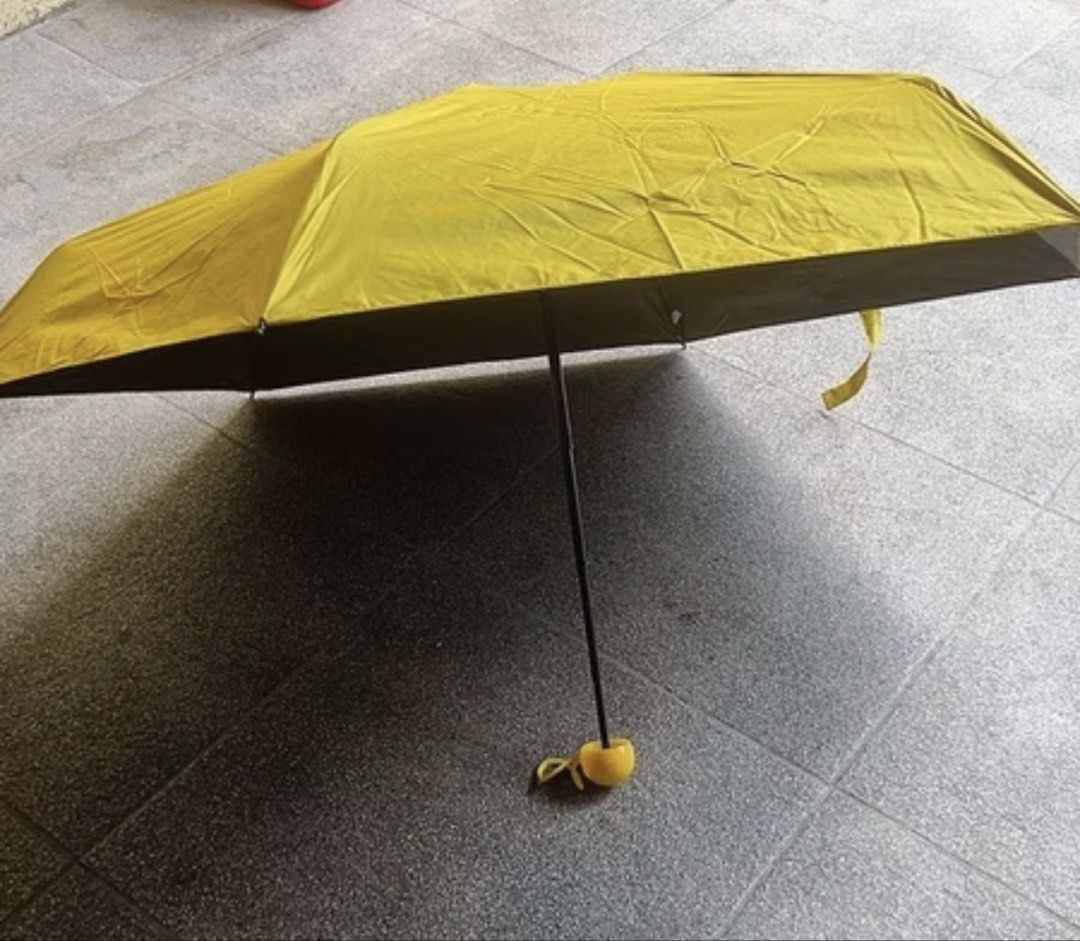 Mini UV Umbrella - Yellow & Purple (Category: Umbrellas) located in Quezon City. Submitted by jnapreloved (Listing ID 1466356082, Image 3). Description: Extra Stocks at Home (New) With Lavender Color too :).