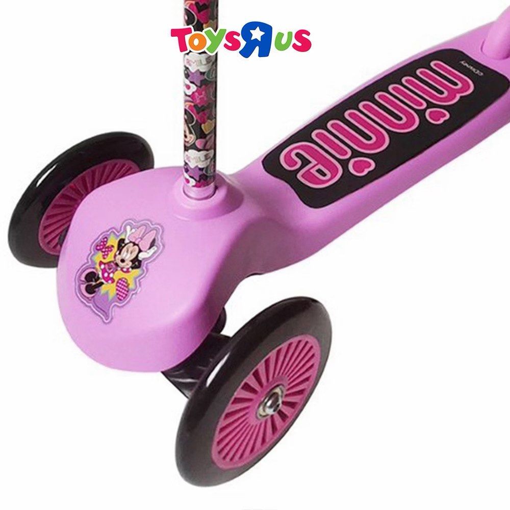 Minnie Mouse 3-Wheel Kick Scooter (Category: Skates, Rollerblades & Scooters) located in Makati City. Submitted by juju_08 (Listing ID 1466422731, Image 2). Description: - Authentic Disney Minnie Mouse pink 3-wheel scooter for kids - Dual front wheels provide extra stability for young riders - Fun cartoon graphics on handlebar pole and Minnie decal near front - Comfortable foam grip handles - Clean and ready to ride with slight wear on the back g