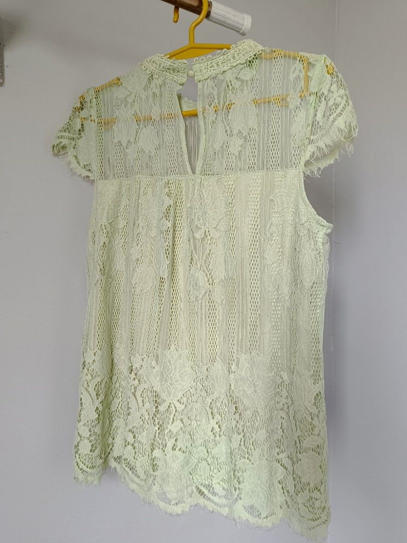 Mint Green All-Over Lace Blouse (Preloved) (Category: Sleeveless) located in Valenzuela. Submitted by justgorjas (Listing ID 1466403551, Image 3). Description: floral lace overlay high neckline with crochet trim short sleeves keyhole button closure at the back Size: Medium (M) (indicated on label) Flaws: Light fraying/fuzziness on the lace trim and sleeve edges from normal preloved wear. Sheer lace construction requires an inner camisole/undergar