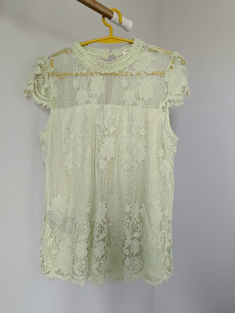 Mint Green All-Over Lace Blouse (Preloved) (Category: Sleeveless) located in Valenzuela. Submitted by justgorjas (Listing ID 1466403551, Image 2). Description: floral lace overlay high neckline with crochet trim short sleeves keyhole button closure at the back Size: Medium (M) (indicated on label) Flaws: Light fraying/fuzziness on the lace trim and sleeve edges from normal preloved wear. Sheer lace construction requires an inner camisole/undergar