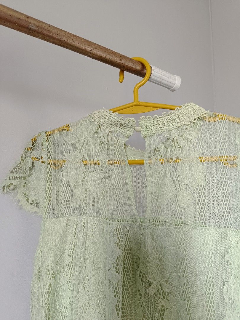 Mint Green All-Over Lace Blouse (Preloved) (Category: Sleeveless) located in Valenzuela. Submitted by justgorjas (Listing ID 1466403551, Image 1). Description: floral lace overlay high neckline with crochet trim short sleeves keyhole button closure at the back Size: Medium (M) (indicated on label) Flaws: Light fraying/fuzziness on the lace trim and sleeve edges from normal preloved wear. Sheer lace construction requires an inner camisole/undergar