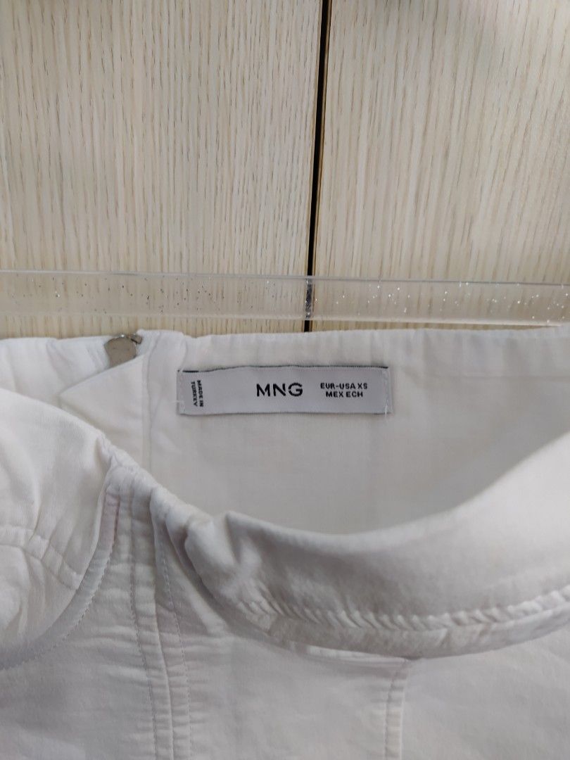 MNG White Tube Top (Category: Others Tops) located in Bacoor. Submitted by lieze (Listing ID 1466438187, Image 2). Description: used for parties cropped tube top zipper sa likod xs size, fit to small.