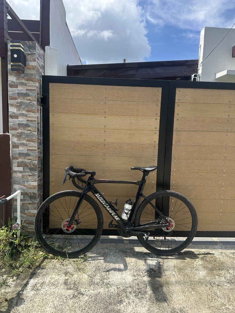 Mountainpeak Road Bike Black with Deep Section Wheels (Category: Bicycles) located in Mandaluyong City. Submitted by dhanlumanas (Listing ID 1466455136, Image 1). Description: Mountainpeak Rexton 3000 (FULL CARBON FRAME SET)‼️ Full Carbon Frame Set Groupset: Shimano Sora 2×9 speed Wheelset: Aeroic wheelset (700c) Brakes: Tektro disc brakes Aeroic Cleats pedal 💰 ₱24,999 (Nego Upon Viewing) No to swap 📍Sapang Maisac, Pampanga RFS: Switch to Grave