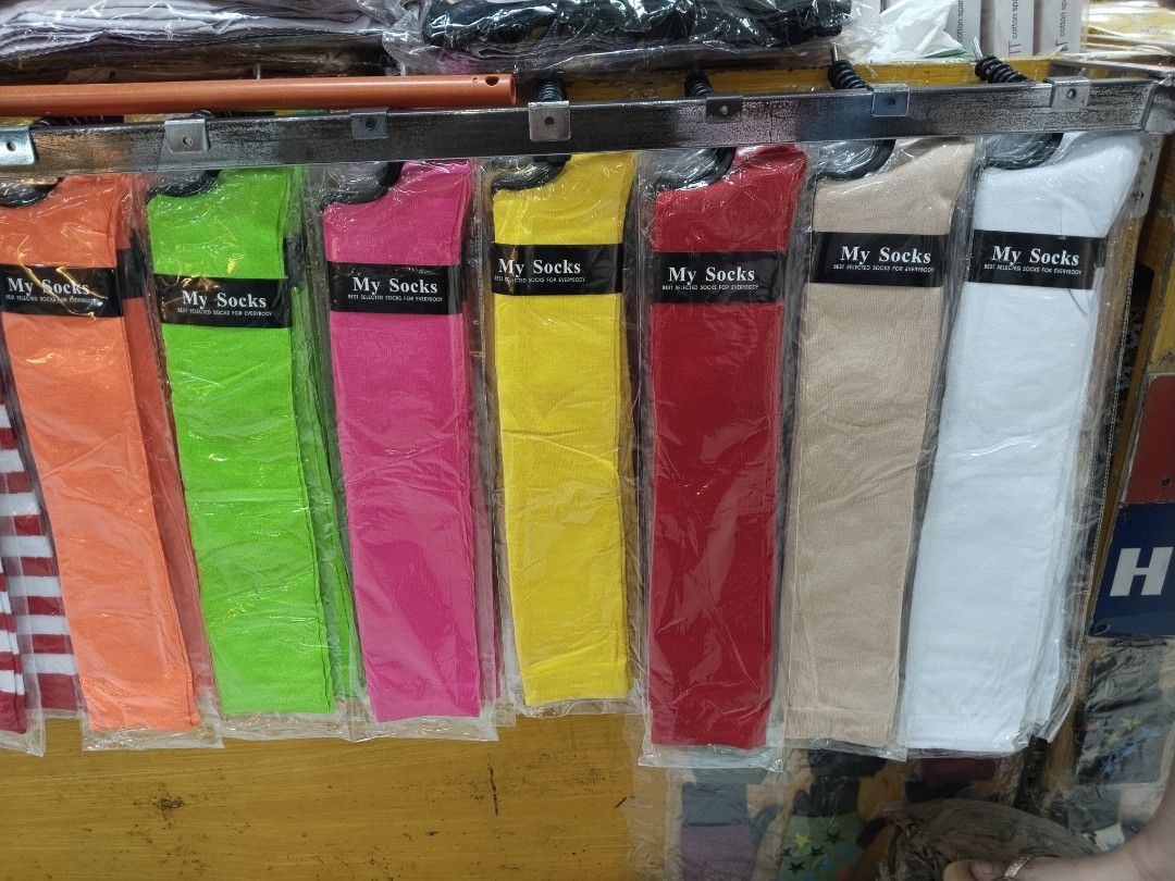 My Socks colorful striped and solid long socks (Category: Socks) located in Manila. Submitted by zdmal (Listing ID 1466404132, Image 1). Description: - Brand: My Socks - Item: Knee-high socks - Condition: Brand new, sealed in original plastic packaging - Available Styles: Solid neon colors & classic stripes (Black/White, Red/White, Orange/White, Green/White) - Ideal For: Cosplay, costumes, sports, and everyday fashion.