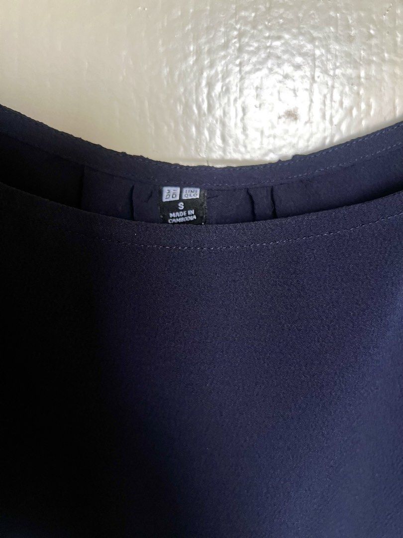 Navy Blue Boxy Blouse (Category: Blouses) located in Pasig City. Submitted by jsyrgt (Listing ID 1466420187, Image 3). Description: Condition: 10/10 Lightweight material, easy to match with skirts or trousers for work or casual outings. Color: Navy Blue MOP: MariBank QR RFS: wardrobe update *Actual color may vary slightly due to lighting and screen settings .