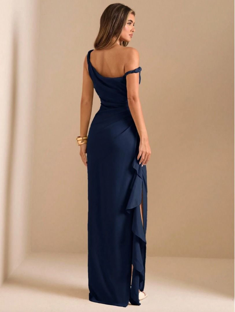 Navy Blue One-Shoulder Ruffle Maxi Dress (Category: Dresses) located in Mandaluyong City. Submitted by lovedbyjaaaam (Listing ID 1466362810, Image 2). Description: - Color: Navy blue / Midnight Blue - Style: One-shoulder, floor-length evening dress - Design: Fitted bodice with diagonal ruching and a high side slit with cascading ruffles - Condition: Brand New, sinukat lang pero di nagamit -Premium, makapal tela - Ideal for: Weddings, galas, and f