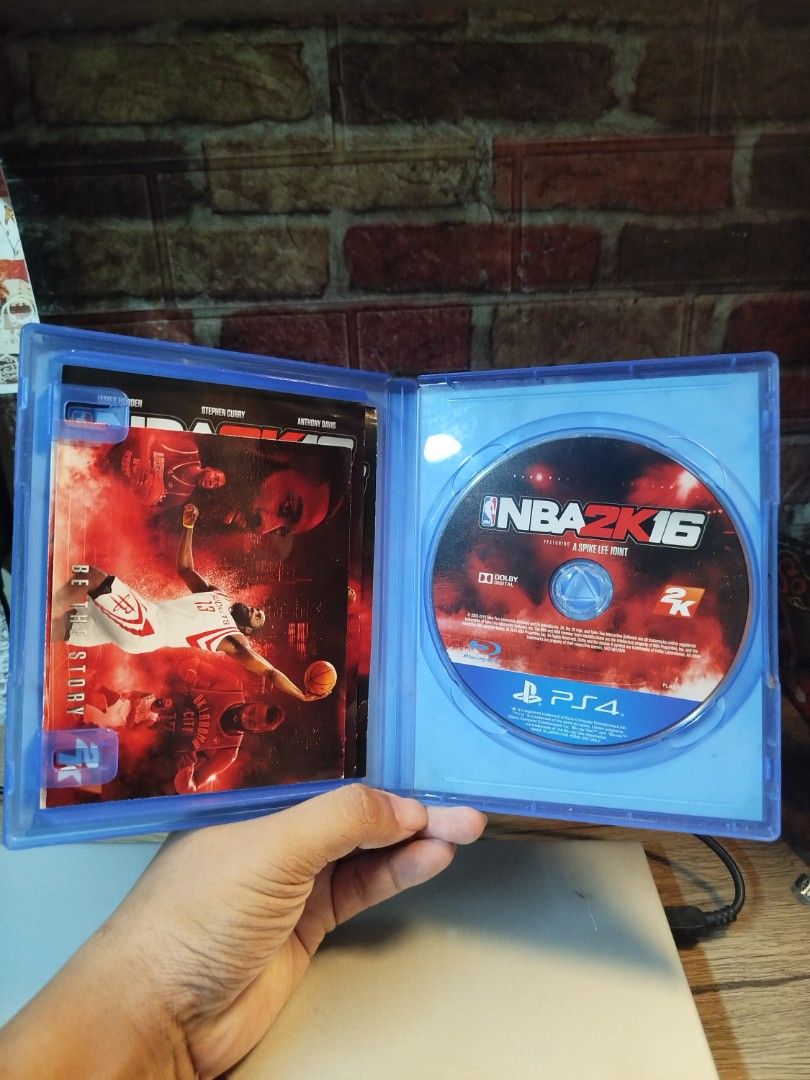 NBA 2K16 PlayStation 4 PS4 Game (Category: PlayStation) located in Binan City. Submitted by pumpkiiin02 (Listing ID 1466489396, Image 3). Description: - Game: NBA 2K16 for PlayStation 4 - Inclusion: Complete with case, cover insert, manual, and game disc - Condition: Case has minor scuffs on front plastic; disc is clean, tested, and working perfectly - Features: Supports solo play and online multiplayer with friends - Shipping: Fast shipping avai