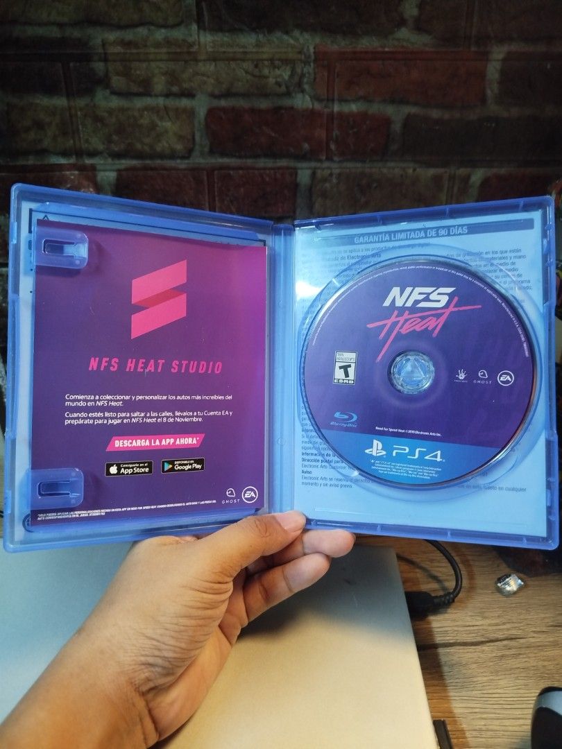 Need for Speed Heat PS4 Game (Category: PlayStation) located in Binan City. Submitted by pumpkiiin02 (Listing ID 1466489392, Image 3). Description: - Title: Need for Speed Heat - Platform: PlayStation 4 (PS4) - Condition: Tested and working properly - Inclusions: Original case, game disc, and NFS Heat Studio promotional insert - Rating: Teen (ESRB) - Language: Supports English and Spanish - Format: Standard Blu-ray disc.