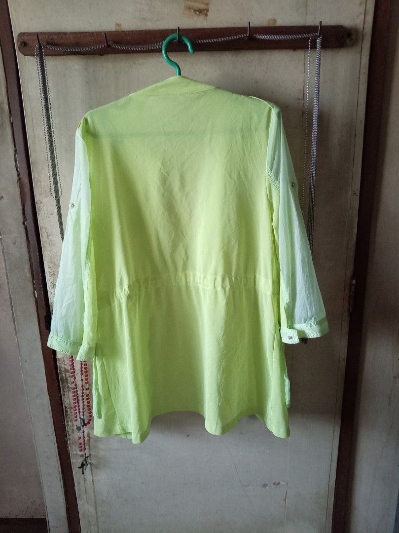 Neon green utility jacket with pockets and drawstring waist (Category: Coats, Jackets and Outerwear) located in Quezon City. Submitted by chacha30.s (Listing ID 1466346010, Image 2). Description: - Eye-catching neon green utility jacket - Secure zip-up front with snap-button closure - Functional storage with 2 chest pockets and 2 lower flap pockets - Adjustable drawstring waist for a flattering, customized fit - Stylish long sheer sleeves for a l