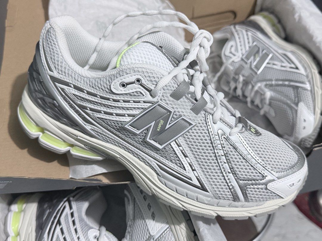 New Balance 1906R White Silver (Category: Sneakers) located in Manila. Submitted by romanticsamurai (Listing ID 1466416272, Image 1). Description: - Model: New Balance 1906R - Colorway: White and silver with lime green accents - Design: Chunky silhouette with mesh upper and metallic overlays - Packaging: Original New Balance grey shoebox with tissue paper included - Available Sizes: US 8.5 and US 9.5 - Condition: Brand New.