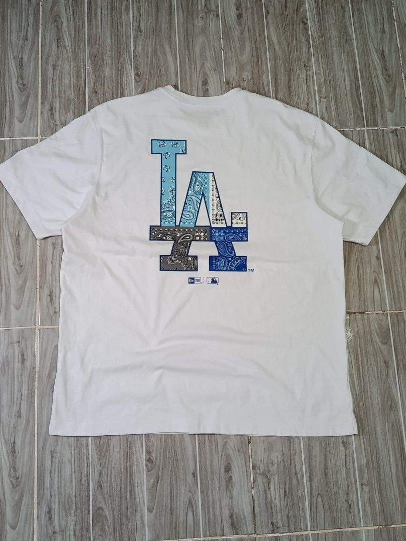 NEW ERA X MLB LA DODGERS TSHIRT (freeshipping) (Category: Tshirts & Polo Shirts ) located in Quezon City. Submitted by gyl-stop (Listing ID 1466506305, Image 2). Description: free shipping 23.5 x 29 excellent condi cr: 9.8/10 issue: none.