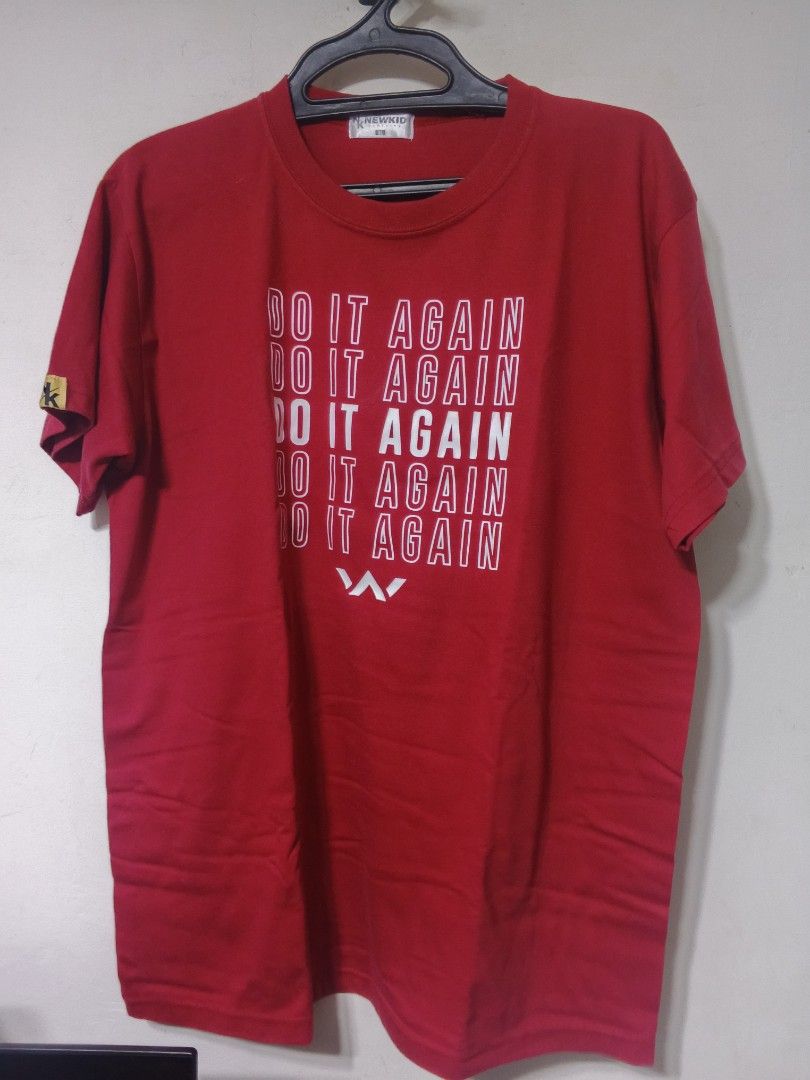 NEWKID "DO IT AGAIN" Graphic Tee - Red (Size XL) (Category: Tshirts & Polo Shirts ) located in San Jose del Monte. Submitted by sam23rd (Listing ID 1466376309, Image 1). Description: Description Brand: NEWKID Color: Red Size: XL (Extra Large) Condition: Pre-loved / Used (Good condition) Details: Graphic print on the front: "DO IT AGAIN" repeated text with logo Brand tag attached at the inner neckline Sleeve label detailing Classic crew neck fit I
