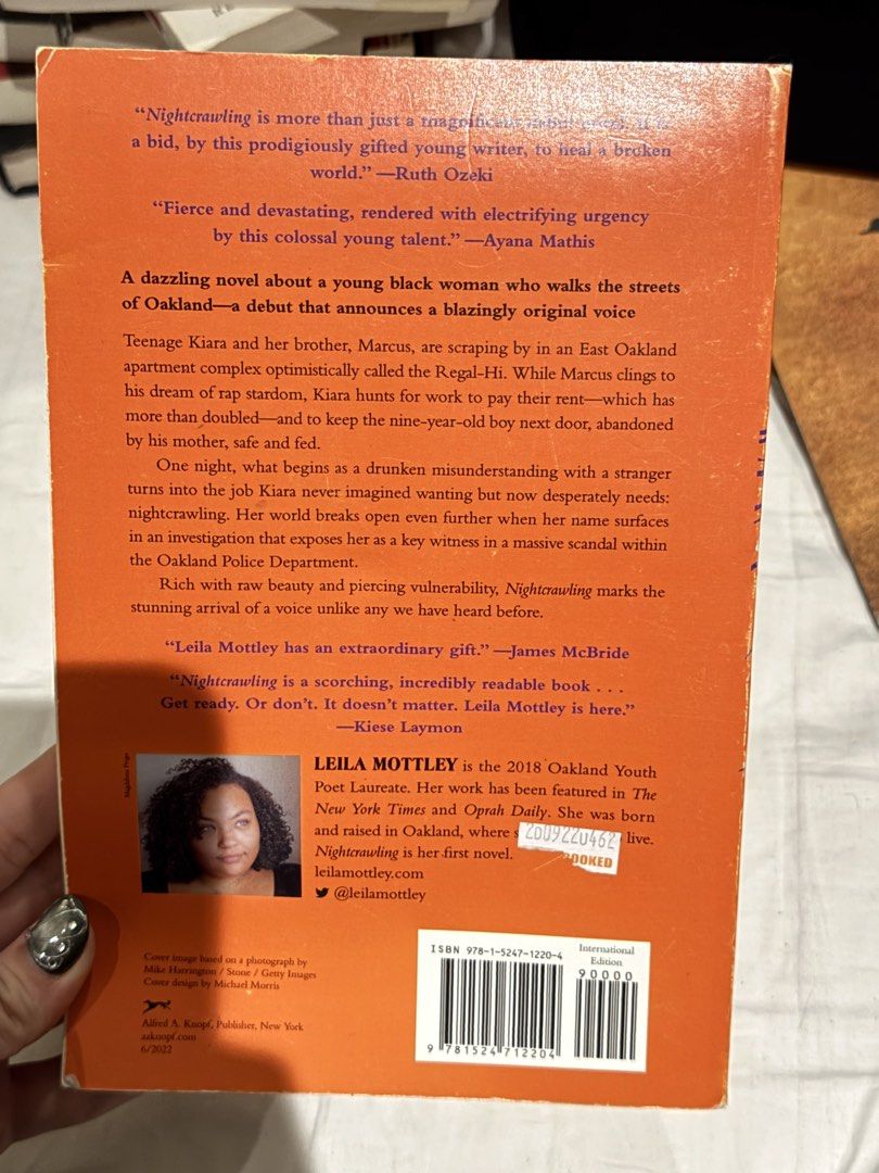 Nightcrawling by Leila Mottley Novel Paperback (Category: Storybooks) located in Makati City. Submitted by 099baby (Listing ID 1466526937, Image 3). Description: Nightcrawling by Leila Mottley 🤍Condition: pages are clean with no writing or highlighting 🤍Flaws: Minor shelf wear on edges/corners, small sticker residue on the back, creased spine Description: Kiara and her brother, Marcus, are scraping by in an East Oakland apartment complex optimi