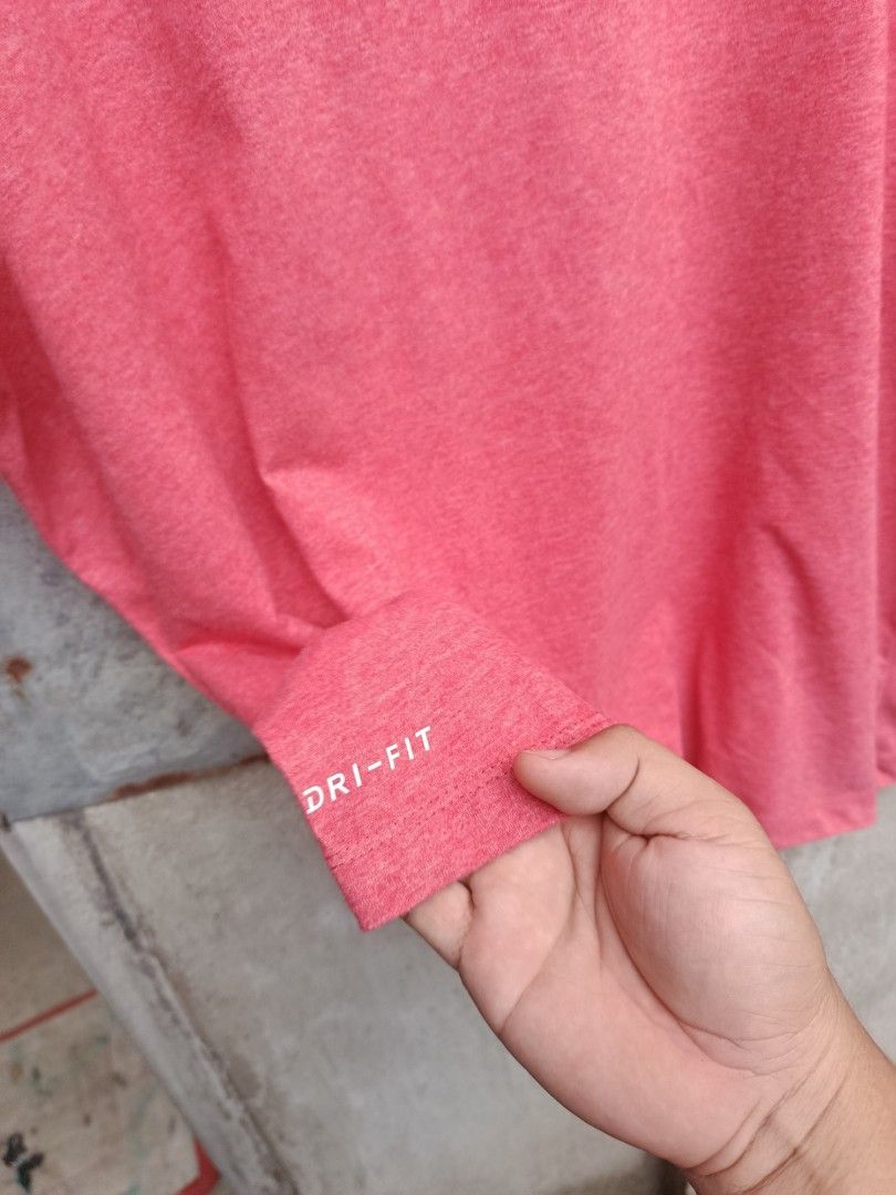 NIKE (Category: Activewear) located in Iloilo. Submitted by _lemornosnas02 (Listing ID 1466429760, Image 3). Description: Nike Dri-FIT Men's Training T-Shirt featuring a red heather fabric and a striped/faded large Nike Swoosh logo -size XL ON TAGS -DIMES 25X28.5 -LOCATION ILOILO -PLUS SHIP VIA LBC.