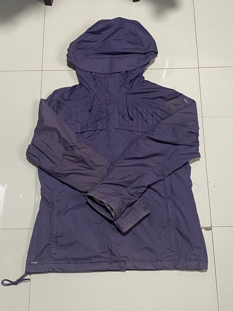 Nike ACG Triple Layer Hooded Jacket Purple Size L (Category: Coats, Jackets and Outerwear) located in Baguio. Submitted by yunothewizardking (Listing ID 1466440637, Image 1). Description: - Brand: Nike ACG - Color: Purple - Size: L (165/88A) - Material: Nylon outer shell with polyester upper lining - Closure: Full zip front with attached hood - Fit/Adjustability: Adjustable drawstrings at waist and hem - Features: Inner elastic powder skirt, mult