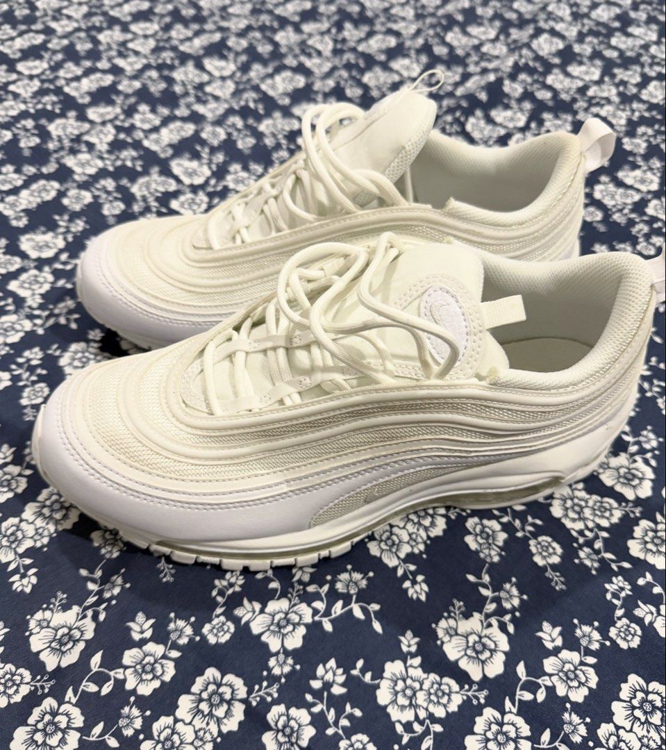 Nike Air Max 97 Triple White (Category: Sneakers) located in Antipolo. Submitted by lucio.cataps (Listing ID 1466399122, Image 2). Description: - Brand/Model: Nike Air Max 97 - Colorway: Clean Triple White - Design: Classic wavy panels, heel and tongue pull tabs - Cushioning: Full-length visible Air midsole for all-day comfort - Condition: Clean upper with minimal signs of wear - Versatility: Great everyday rotation sneaker.