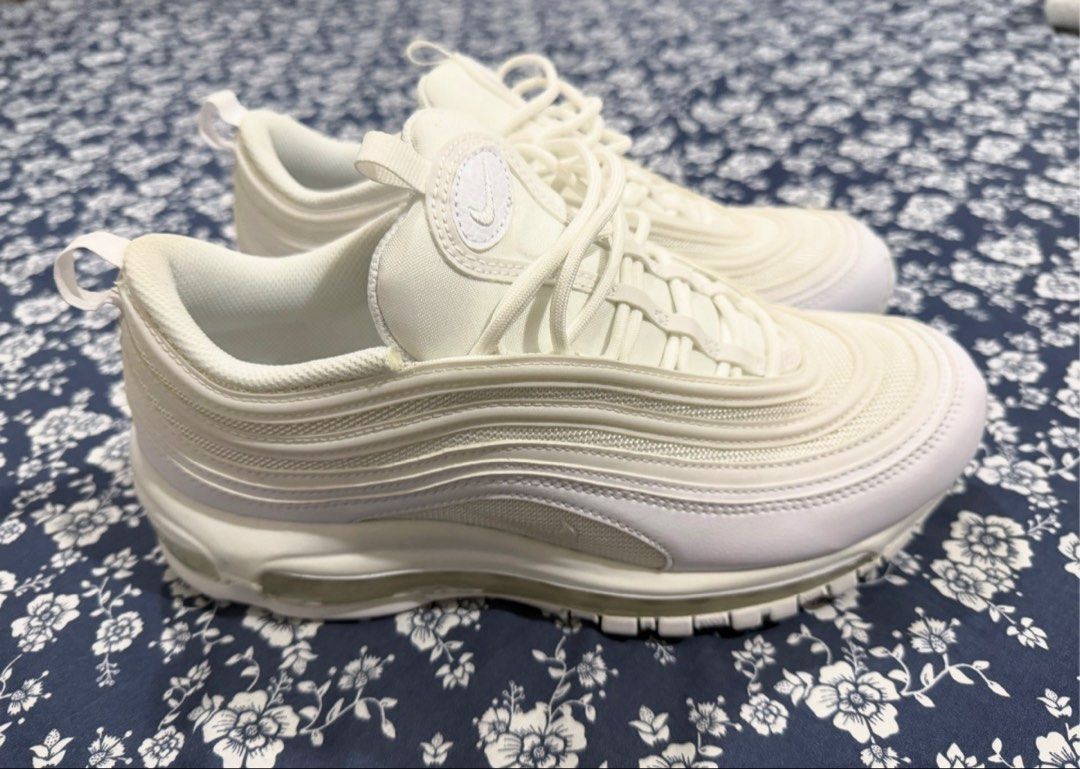 Nike Air Max 97 Triple White (Category: Sneakers) located in Antipolo. Submitted by lucio.cataps (Listing ID 1466399122, Image 1). Description: - Brand/Model: Nike Air Max 97 - Colorway: Clean Triple White - Design: Classic wavy panels, heel and tongue pull tabs - Cushioning: Full-length visible Air midsole for all-day comfort - Condition: Clean upper with minimal signs of wear - Versatility: Great everyday rotation sneaker.