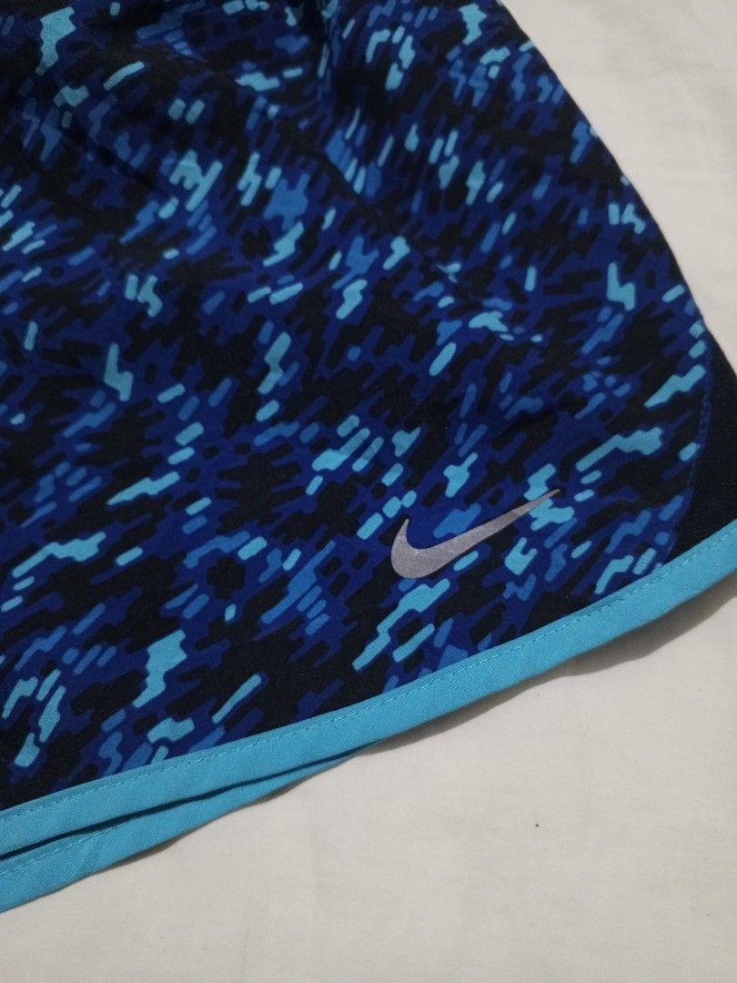 Nike blue camou running shorts (Category: Activewear) located in Santa Maria. Submitted by paulo-garcia21 (Listing ID 1466466767, Image 2). Description: large on tag waist 28 to 34 lenght 11 hem 13 no flaws excellent.