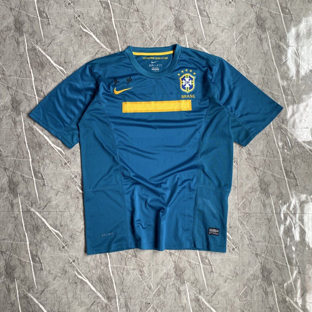 Nike Brazil Jersey (Category: Activewear) located in Naga. Submitted by wanderingtreasures.ph1 (Listing ID 1466515295, Image 1). Description: Nike Brazil Jersey Condition 9/10 Color rate 9.8/10 Embroidered Brazil / Swoosh L-XL size Width 22.5 / Length 29.5 Minimal issue on front print php + sf 📩.