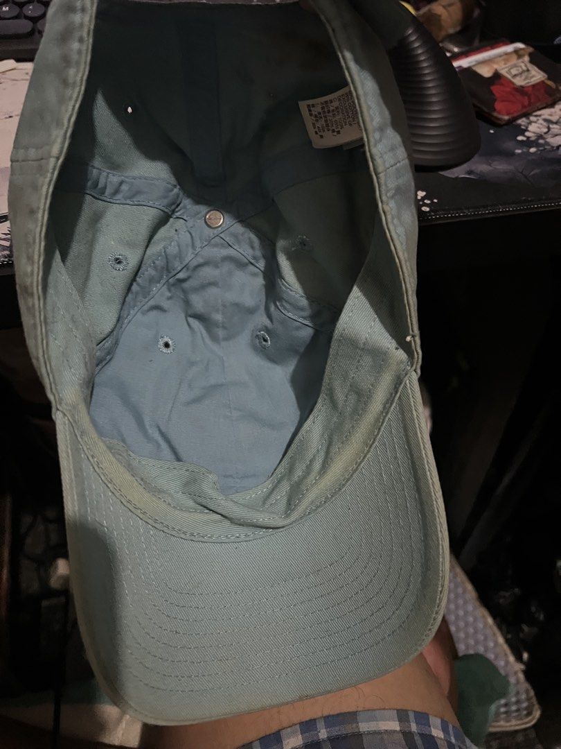 Nike Club Heritage86 strapback cap (Category: Caps & Hats) located in Paranaque City. Submitted by ekkostarfall.12902 (Listing ID 1466507453, Image 3). Description: - Color: Gem - Material: 100% cotton - Closure: Adjustable strapback with metal buckle - Design: Embroidered logo on the front - 100% original - Condition: Noticeable rust-colored staining on the back panel and light wearing along the inner headband RFS: not using anymore, no time to 