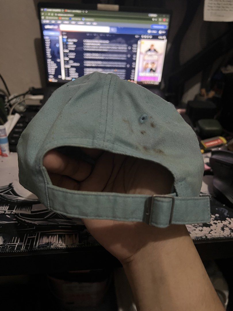 Nike Club Heritage86 strapback cap (Category: Caps & Hats) located in Paranaque City. Submitted by ekkostarfall.12902 (Listing ID 1466507453, Image 2). Description: - Color: Gem - Material: 100% cotton - Closure: Adjustable strapback with metal buckle - Design: Embroidered logo on the front - 100% original - Condition: Noticeable rust-colored staining on the back panel and light wearing along the inner headband RFS: not using anymore, no time to 